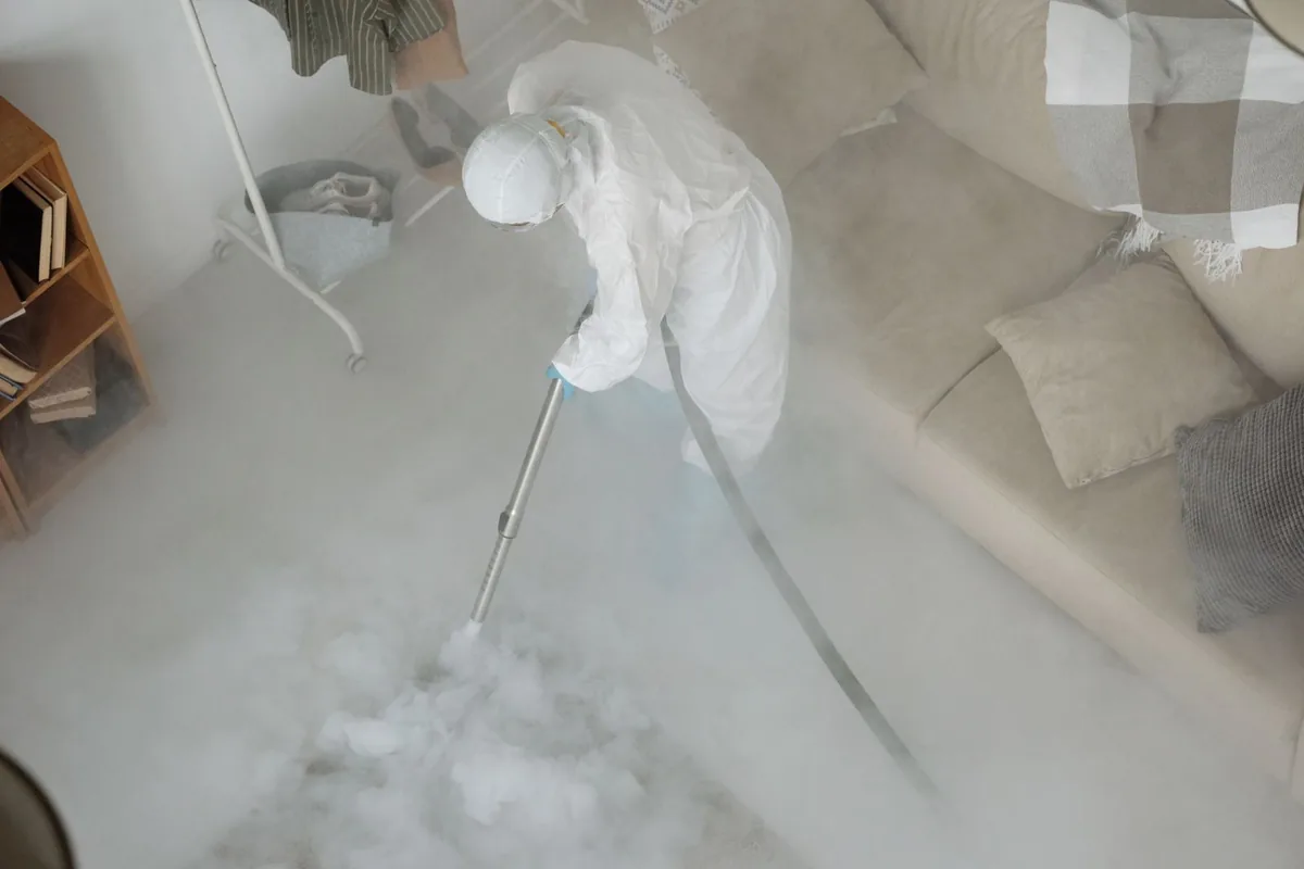 Biohazard cleanup technician in protective equipment, North Merrick, NY
